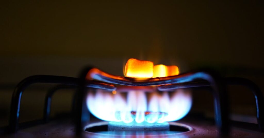 pexels-photo-668374-668374 Roasting marshmallows over an indoor gas stove for a cozy treat.